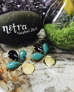Contemporary coin details and stone earrings