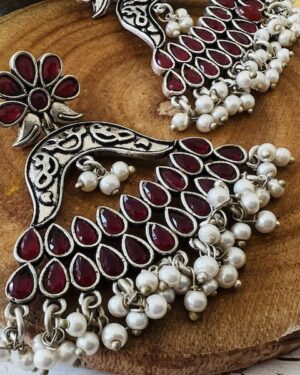 Carved engraved earrings with garnet stones
