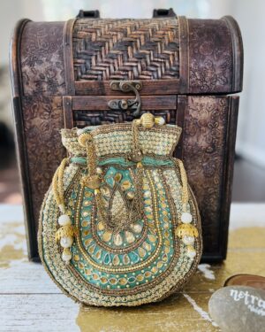 Gota embroidered potli bag in raw silk